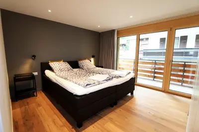 Ein Bett oder Betten in einem Zimmer der Unterkunft Derby ski-in/out