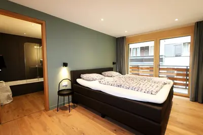 Ein Bett oder Betten in einem Zimmer der Unterkunft Derby ski-in/out