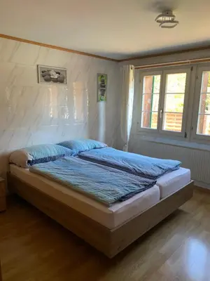 Ein Bett oder Betten in einem Zimmer der Unterkunft Hotel Rössli