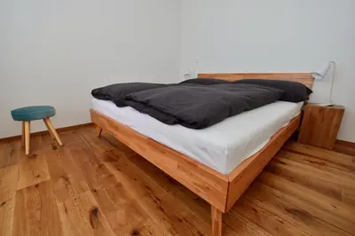 Ein Bett oder Betten in einem Zimmer der Unterkunft Alpen-Park
