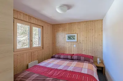 Ein Bett oder Betten in einem Zimmer der Unterkunft Chalet Krokus