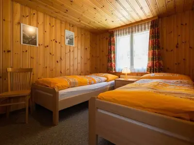 Ein Bett oder Betten in einem Zimmer der Unterkunft Apartment Zur Post by Interhome