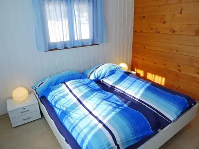 Ein Bett oder Betten in einem Zimmer der Unterkunft Holiday Home Godo by Interhome