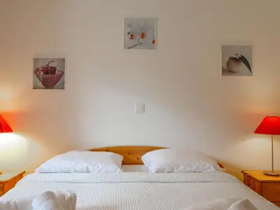 Ein Bett oder Betten in einem Zimmer der Unterkunft Chalet Chalet A Coeur by Interhome