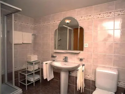 Ein Badezimmer in der Unterkunft Castel Appartemente