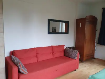 Ein Sitzbereich in der Unterkunft Zentral gelegene Wohnung mit grossem Garten