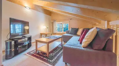 Ein Sitzbereich in der Unterkunft Chalet Aberot