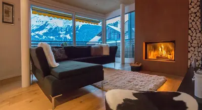 Ein Sitzbereich in der Unterkunft Chalet Am Acher