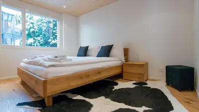 Ein Bett oder Betten in einem Zimmer der Unterkunft Chalet Am Acher