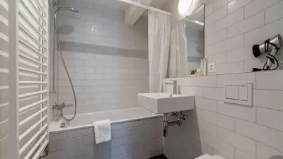 Ein Badezimmer in der Unterkunft Chalet Arven