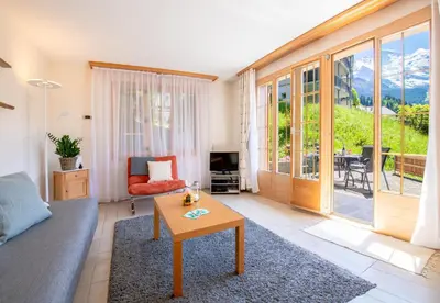 Ein Sitzbereich in der Unterkunft Chalet Panorama