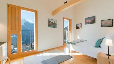 Ein Bett oder Betten in einem Zimmer der Unterkunft Chalet Roossi