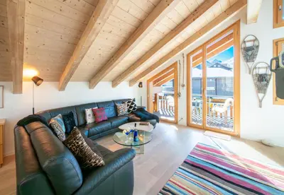 Ein Sitzbereich in der Unterkunft Chalet Stella Penthouse Residence