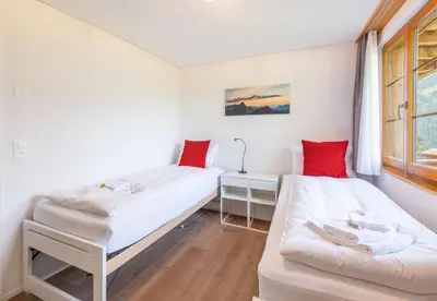 Ein Bett oder Betten in einem Zimmer der Unterkunft Panoramapark Soleil Chalet A