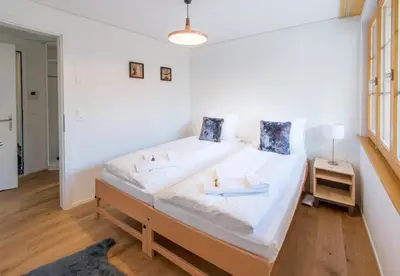 Ein Bett oder Betten in einem Zimmer der Unterkunft Panoramapark Soleil Chalet B