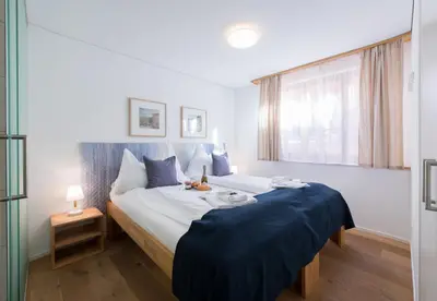 Ein Bett oder Betten in einem Zimmer der Unterkunft Panoramapark Soleil Chalet B