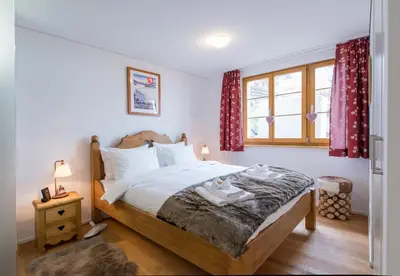 Ein Bett oder Betten in einem Zimmer der Unterkunft Panoramapark Soleil Chalet C