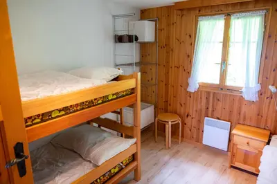 Ein Bett oder Betten in einem Zimmer der Unterkunft Chalet Orion