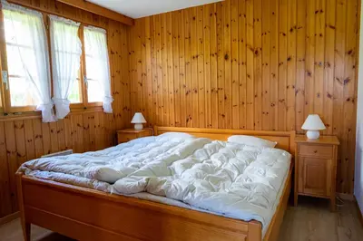 Ein Bett oder Betten in einem Zimmer der Unterkunft Chalet Orion