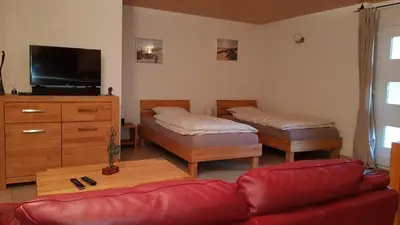 Ein Bett oder Betten in einem Zimmer der Unterkunft Studio dans une villa à Veyras
