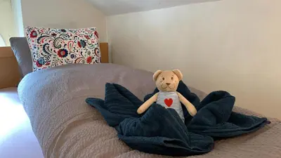 Ein Bett oder Betten in einem Zimmer der Unterkunft Ferienwohnung Meiringen 