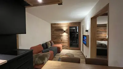Ein Sitzbereich in der Unterkunft Les Cerfs - Appartement & Studio - ANZERE