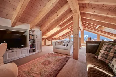 Ein Sitzbereich in der Unterkunft Chalet Bärgsunna Penthouse