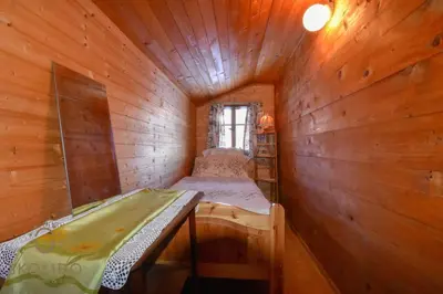 Ein Bett oder Betten in einem Zimmer der Unterkunft Cosy Chalet in Brig-Glis