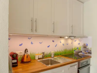 Küche/Küchenzeile in der Unterkunft Studio Eperon B 22 by Interhome