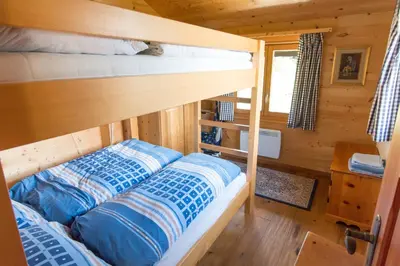 Ein Bett oder Betten in einem Zimmer der Unterkunft Chalet Valaisia
