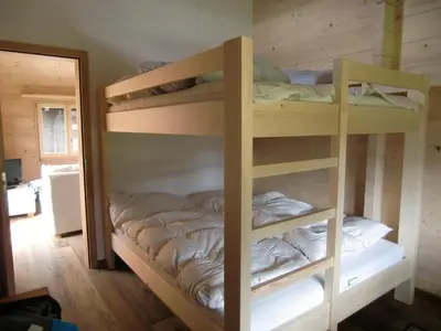 Ein Bett oder Betten in einem Zimmer der Unterkunft Chalet Valaisia