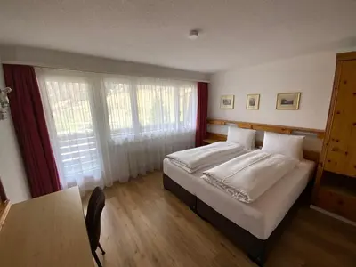 Ein Bett oder Betten in einem Zimmer der Unterkunft Alfa Appartements Superior