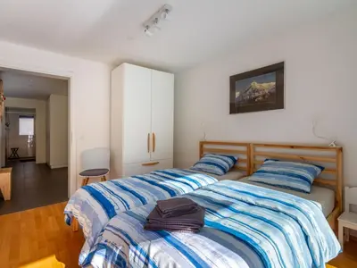 Ein Bett oder Betten in einem Zimmer der Unterkunft Apartment Terrasse by Interhome