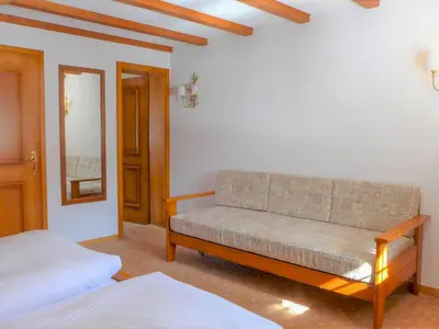 Ein Bett oder Betten in einem Zimmer der Unterkunft Apartment Pia-2 by Interhome