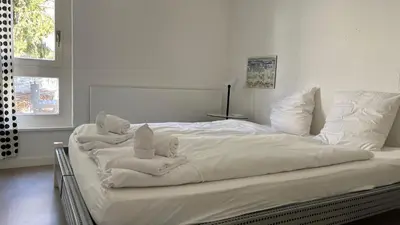 Ein Bett oder Betten in einem Zimmer der Unterkunft Seewohnung 2