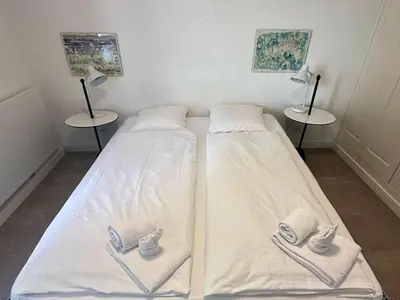 Ein Bett oder Betten in einem Zimmer der Unterkunft Seewohnung 2