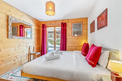 Ein Bett oder Betten in einem Zimmer der Unterkunft Chalet Magrappe, accès direct à la piste des Mayens de Veysonnaz
