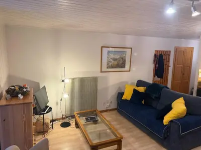 Ein Sitzbereich in der Unterkunft Au village d'Evolène, bel appartement avec terrasse
