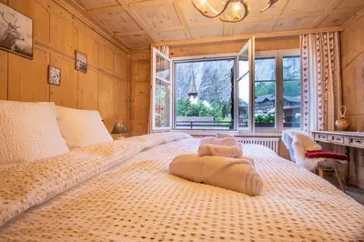 Ein Bett oder Betten in einem Zimmer der Unterkunft Wasserfallhüsli in Lauterbrunnen, near Interlaken, Mürren, Wengen