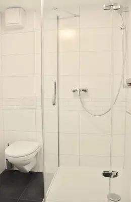 Ein Badezimmer in der Unterkunft Modern Family Apartment in Interlaken Center