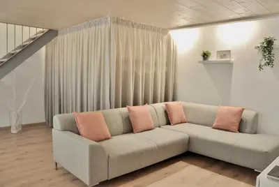 Ein Sitzbereich in der Unterkunft Modern Family Apartment in Interlaken Center