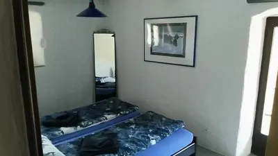 Ein Bett oder Betten in einem Zimmer der Unterkunft Residenza Americana