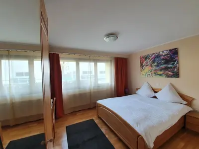 Ein Bett oder Betten in einem Zimmer der Unterkunft Le Merle Châtelain