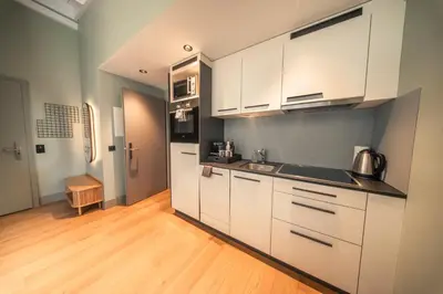 Küche/Küchenzeile in der Unterkunft HOP Apartments & Suites