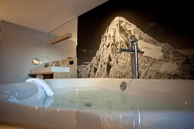 Ein Bett oder Betten in einem Zimmer der Unterkunft Eiger Mountain & Soul Resort