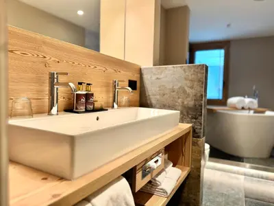 Ein Badezimmer in der Unterkunft Eiger Mountain & Soul Resort