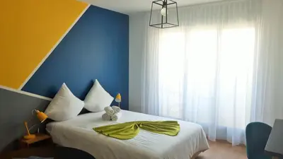 Ein Bett oder Betten in einem Zimmer der Unterkunft Studio vue imprenable