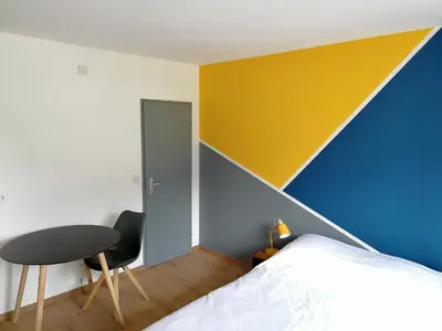 Ein Bett oder Betten in einem Zimmer der Unterkunft Studio vue imprenable