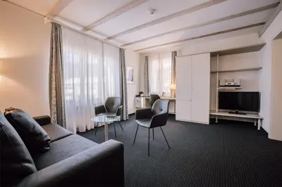 Ein Sitzbereich in der Unterkunft Stella Swiss Quality Hotel