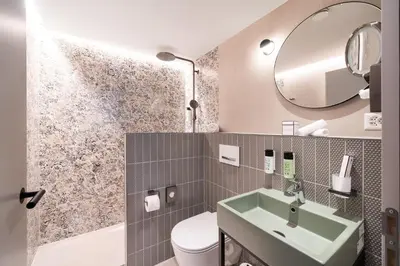 Ein Badezimmer in der Unterkunft Stella Swiss Quality Hotel